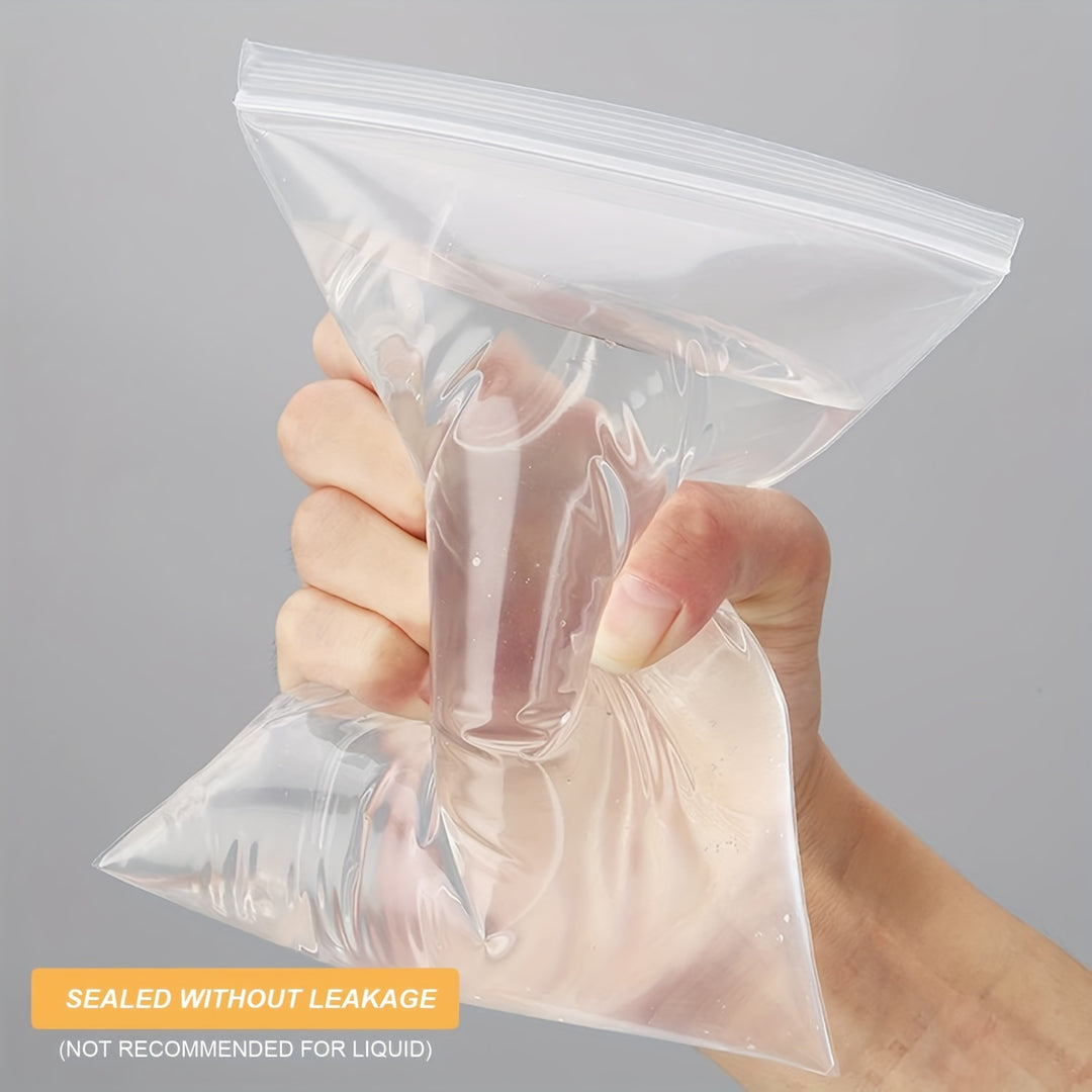 100pcs Extra-Large Clear Plastic Resealable Zipper Bags - Airtight, Waterproof, and Durable Storage Pouches for Snacks, Nuts, Seeds, Candy, Food, Travel, and Kitchen Supplies - Perfect for Packaging, Transportation, and Organization